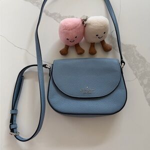 Kate Spade New York Leila Mini Flap Crossbody bag in blue pebbled leather